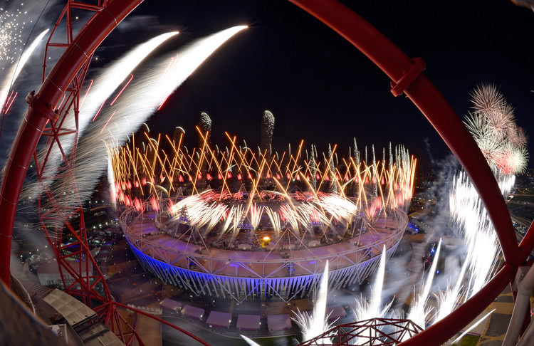 Fireworks illuminate the sky over Olympic Stadium